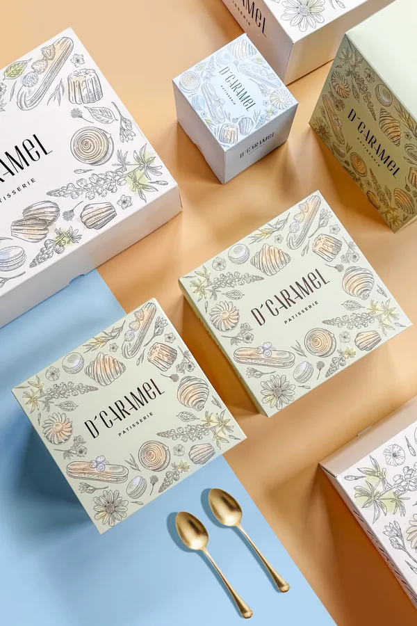 d'caramel patisserie — embossed patisserie gift boxes with gold spoons